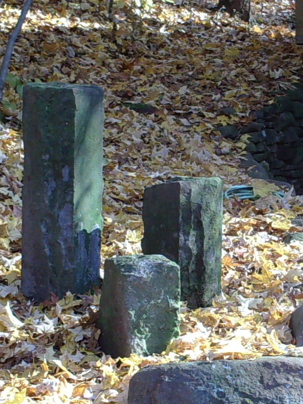 Three rectangular stone blocks in the fall