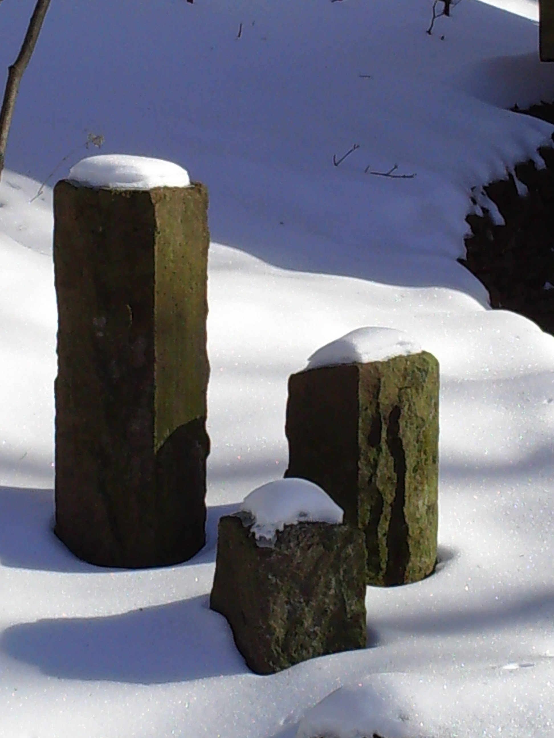 Three rectangular stone blocks in the winter